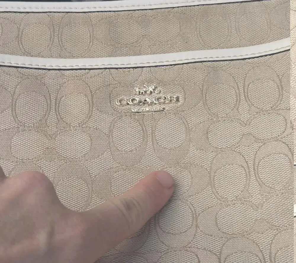 Coach authentic file